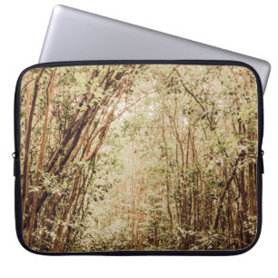 PATHWAY SURROUNDED WITH TALL AND GREEN TREES LAPTOP SLEEVE
