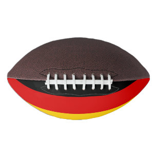 Patriotic american football with flag of Germany