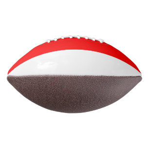 Patriotic american football with flag of Indonesia
