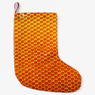 Pattern of a section of wax honeycomb from a bee h small christmas stocking