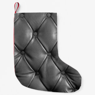 pattern of black genuine leather texture using as  small christmas stocking