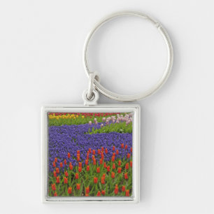 Pattern of tulips and grape hyacinth flowers, 2 key ring