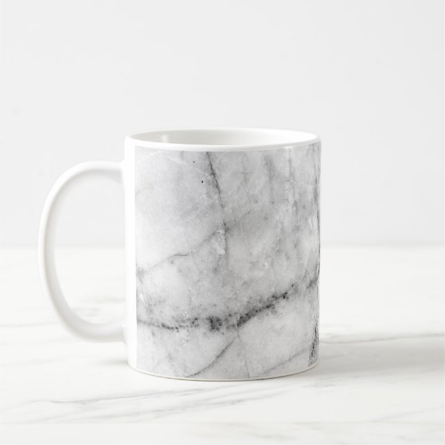 Pattern on the white marble floor texture and back coffee mug (Left)