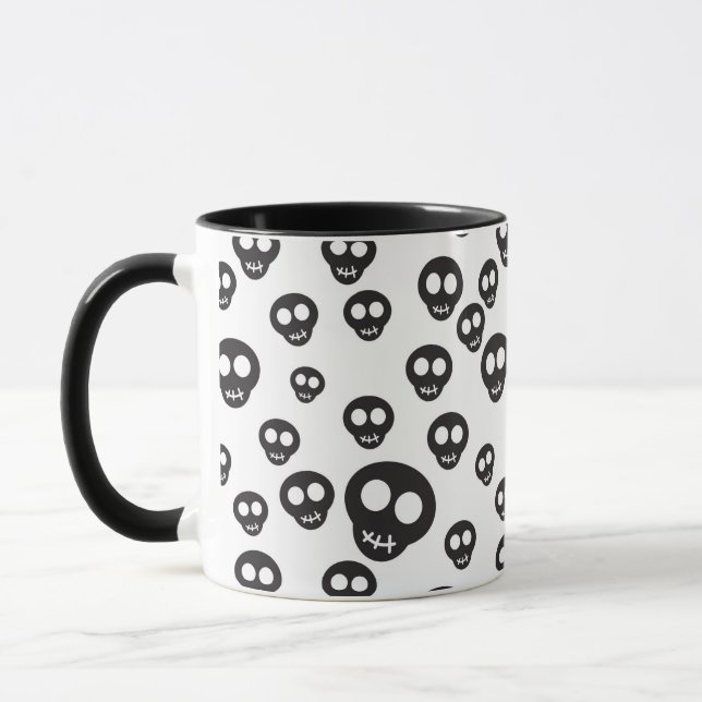Pattern with black skulls on white mug (Left)