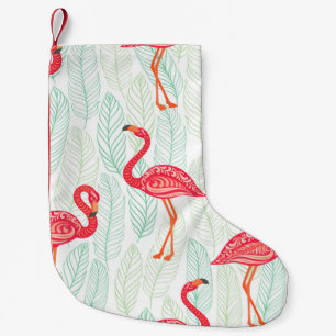 Pattern with pink flamingo ornaments on a backgrou small christmas stocking