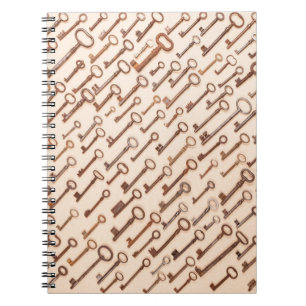 Pattern with real vintage victorian keys on kraft notebook