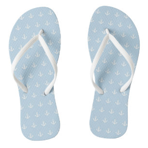 Pattern with white anchors on blue flip flops