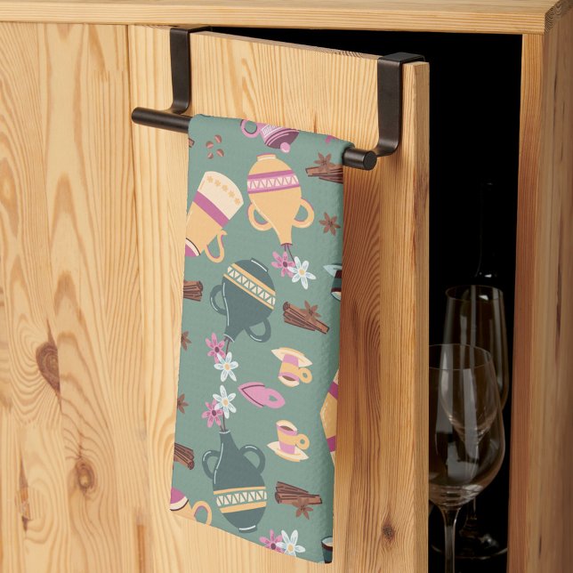 Patterned fabric featuring colorful teapots, cups, tea towel (Creator Uploaded)