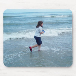 Patty running on the beach mouse mat