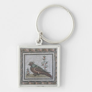 Pavement depicting a pheasant key ring