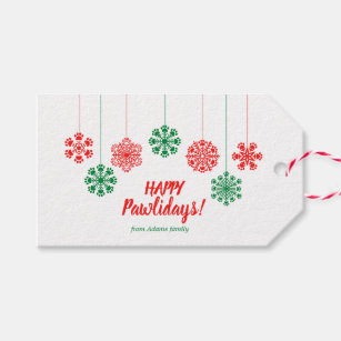 Paw print snowflakes in red and green colour gift tags