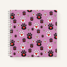 Paw prints with red hearts on pink 