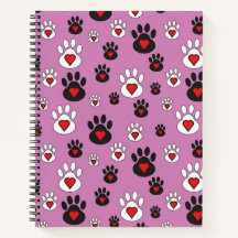 Paw prints with red hearts on pink 