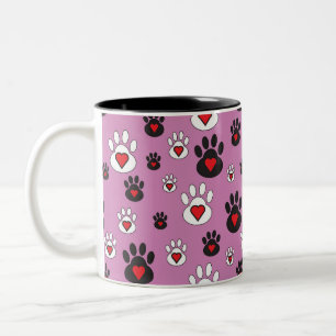 Paw prints with red hearts on pink  Two-Tone coffee mug
