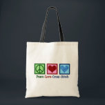 Peace Love Cross Stitch Tote Bag<br><div class="desc">Cute cross stitching gift for someone who loves to create things. This Peace Love Cross Stitch gift features a peace sign,  heart,  and a pretty cross-stitch pattern heart.</div>