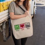 Peace Love Film Tote Bag<br><div class="desc">Peace Love Film. A cool filmmaker gift for an obsessed movie watcher,  a true film buff cinema gift featuring a clapperboard,  clapper,  or clapboard next to a peace sign and heart. Cute present for a director,  producer,  cinematographer,  screenplay writer,  or film crew who loves making movies.</div>