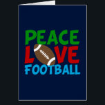 Peace Love Football Player Christmas Card<br><div class="desc">Peace Love Football. A cute football Christmas card for a player or fan. A coach can send these cards out to his team. This cool sports design is green,  red,  and blue with the ball in the centre.</div>