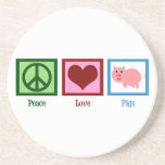 Peace Love Pigs Coaster<br><div class="desc">A pretty green peace sign, red heart, and a cute pink pig. I love farm animal gifts and pigs are my favourite.</div>