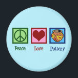 Peace Love Pottery Magnet<br><div class="desc">A pretty pottery magnet gift for an artist who uses clay and a kiln to make ceramic arts and pots. A cute green peace sign, red heart, and a beautiful pottery bowl image from Graphics Factory. A nice potter present or a great way to advertise your ceramics classes or pottery...</div>