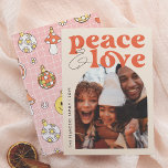 Peace & Love Retro Groovy Arch Fun Christmas Photo Holiday Card<br><div class="desc">A fun and colourful Christmas Holiday Photo Card design! This "Peace & Love Retro Groovy Arch Fun Christmas Photo Card" design features "Peace & Love" in a retro, groovy font. The ampersand in casual handwriting adds a laid-back feel. Below, to the right, the arch-shaped frame showcases a custom photo to...</div>