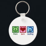 Peace Love Surfing Key Ring<br><div class="desc">Peace Love Surfing Gift. An awesome surfing design with a peace sign,  heart,  and a cool surfer on a surfboard riding blue waves. I love going to the ocean when the surf is wild.</div>