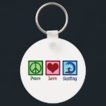 Peace Love Surfing Key Ring<br><div class="desc">Peace Love Surfing Gift. An awesome surfing design with a peace sign,  heart,  and a cool surfer on a surfboard riding blue waves. I love going to the ocean when the surf is wild.</div>