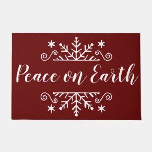 Peace on earth with snowflake  doormat