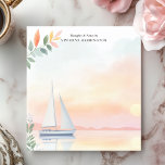 Peaceful Sunset Sailboat Watercolor Personalised Notepad<br><div class="desc">This beautifully designed personalised notepad features a tranquil sailboat drifting across calm waters at sunset, framed by delicate watercolor leaves. The soft pastel hues and warm sunset glow create a soothing and elegant aesthetic, perfect for ocean lovers, coastal decor fans, or those who appreciate serene nautical themes. Customise the text...</div>
