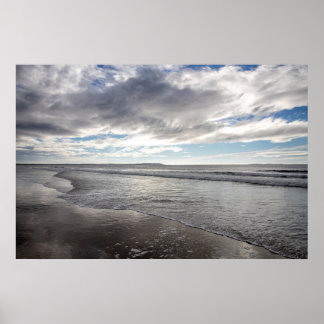 Peaceful waves on the coastline poster