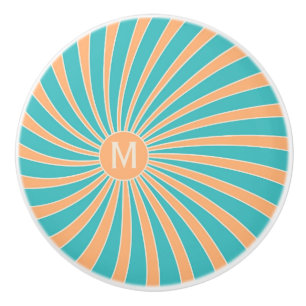 Peach and turquoise retro style sunburst design ceramic knob