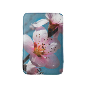 Peach Blossom Branch and Blue Sky Bath Mat