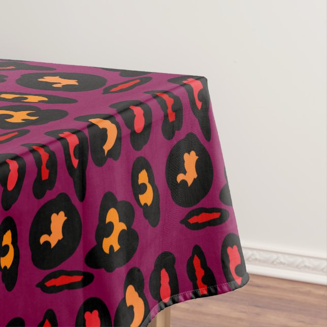peach red in black border patterns on wine colour tablecloth (In Situ)