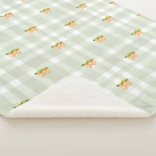 Peaches and sage green plaid sherpa throw blanket