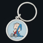 Peanuts | Linus & His Blanket Key Ring<br><div class="desc">Carry a piece of Peanuts wherever you go with this keychain featuring Linus and his iconic blanket. Perfect for Peanuts fans,  this keychain captures Linus’s comforting and lovable personality,  making it a charming addition to your keys,  bags,  or backpacks.</div>