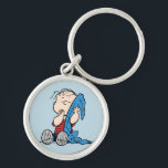 Peanuts | Linus & His Blanket Key Ring<br><div class="desc">Carry a piece of Peanuts wherever you go with this keychain featuring Linus and his iconic blanket. Perfect for Peanuts fans,  this keychain captures Linus’s comforting and lovable personality,  making it a charming addition to your keys,  bags,  or backpacks.</div>