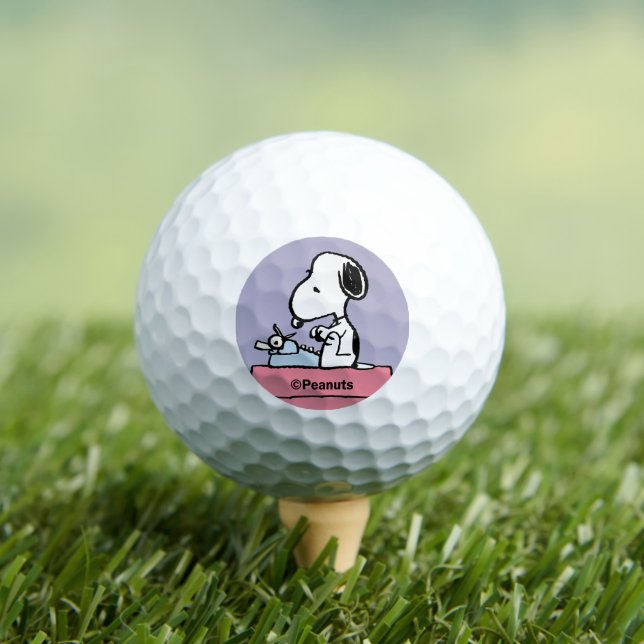 Peanuts | Snoopy at the Typewriter Golf Balls (Insitu Tee)