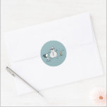Peanuts | Snoopy Builds A Snowman Classic Round Sticker<br><div class="desc">Check out this fun Peanuts design featuring Snoopy.</div>