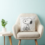 PEANUTS | Snoopy on Black White Comics Cushion<br><div class="desc">Add a touch of Peanuts charm to your home decor with this throw pillow featuring Snoopy against a backdrop of black-and-white comic strips. Perfect for your living room,  bedroom,  or office,  this pillow brings the timeless appeal of Snoopy and the Peanuts gang to your space.</div>