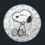 PEANUTS | Snoopy on Black White Comics Dartboard<br><div class="desc">This Peanuts artwork features Snoopy sitting on background of black and white Charles M. Schulz comic strips.</div>