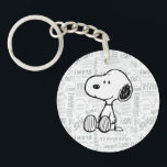 PEANUTS | Snoopy on Black White Comics Key Ring<br><div class="desc">This Peanuts artwork features Snoopy sitting on background of black and white Charles M. Schulz comic strips.</div>