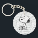 PEANUTS | Snoopy on Black White Comics Key Ring<br><div class="desc">This Peanuts artwork features Snoopy sitting on background of black and white Charles M. Schulz comic strips.</div>