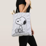 PEANUTS | Snoopy on Black White Comics Tote Bag<br><div class="desc">This Peanuts artwork features Snoopy sitting on background of black and white Charles M. Schulz comic strips.</div>