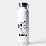 Peanuts | Snoopy Plays Tennis Water Bottle<br><div class="desc">In the Peanuts comic strip and animated films,  Snoopy is often depicted playing tennis against his owner Charlie Brown or other characters like Linus and Lucy. This design showcases Snoopy's athletic abilities and competitive spirit in a humourous way.</div>