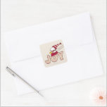 Peanuts | Snoopy & Woodstock Joy Sled Ride Square Sticker<br><div class="desc">Celebrate the holidays and your love of Peanuts with this ugly sweater Christmas design featuring Snoopy and Woodstock sledding in Snoopy's food dish.</div>