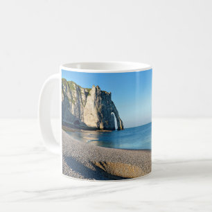 Pebble beach and cliff of Etretat in France Postca Coffee Mug