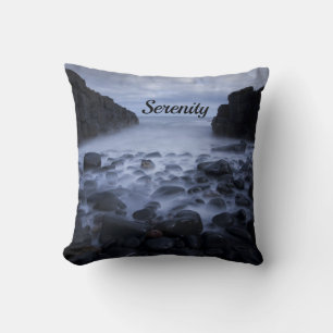 Pebbles and Rocks along the Ocean Shoreline Cushion