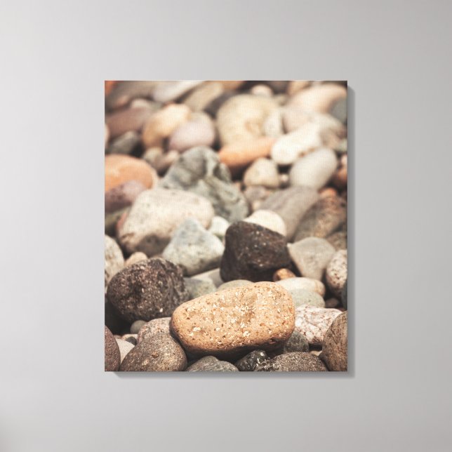 Pebbles on the beach canvas print (Front)