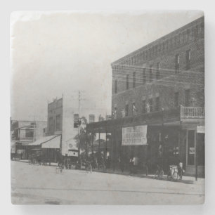 Pedestrians, cyclists, and horse-carriages stone coaster