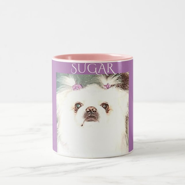 Pekingese coffee cup in purple and pink. (Center)