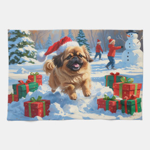 Pekingese Dog Running in Snow with Christmas Hat Tea Towel